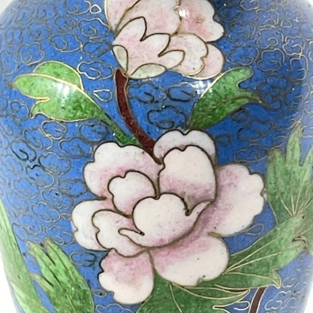 Chinese blue cloisonne and brass vase with wooden stand.